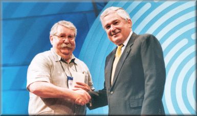 Vern receiving his award from Gerstner